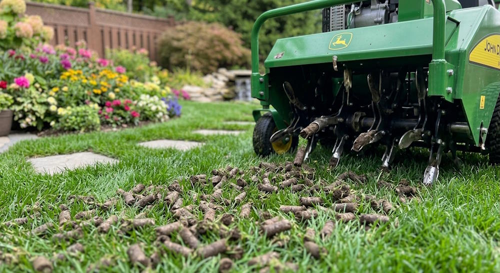 Aerating lawn machine