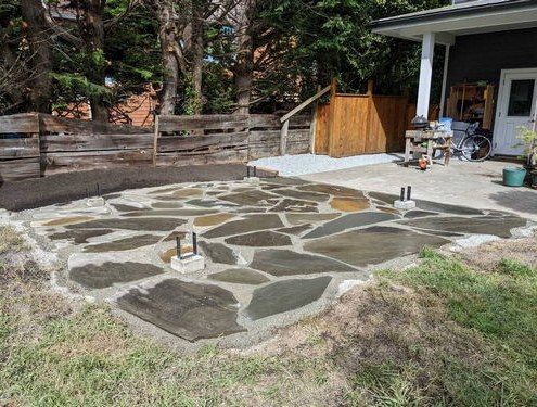 Flagstone patio installation after before pergola