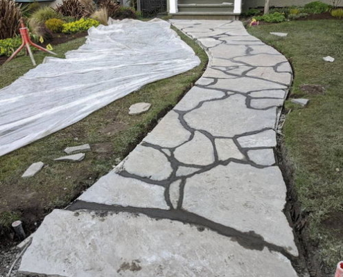 Flagstone walkway during grouting